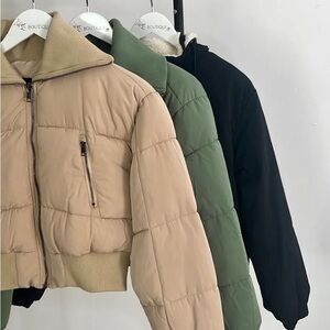 New with tags jacket. Beige. Never worn. Size small